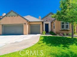 35912 Poplar Crest Road Wildomar, CA 92595 - Photo 1 of 1 a front view of a house with a garden and yard