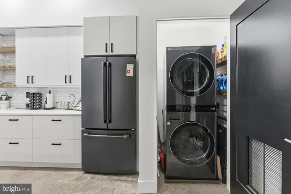 a white toilet sitting next to a shower curtain