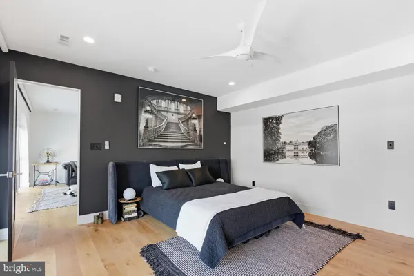 a bedroom with a bed and furniture