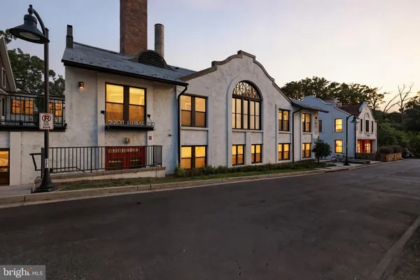 a black and white wall with black and white checkered