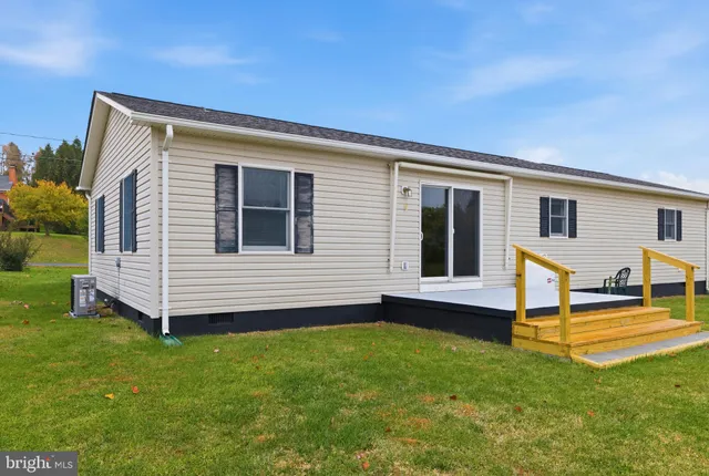 a front view of house with yard