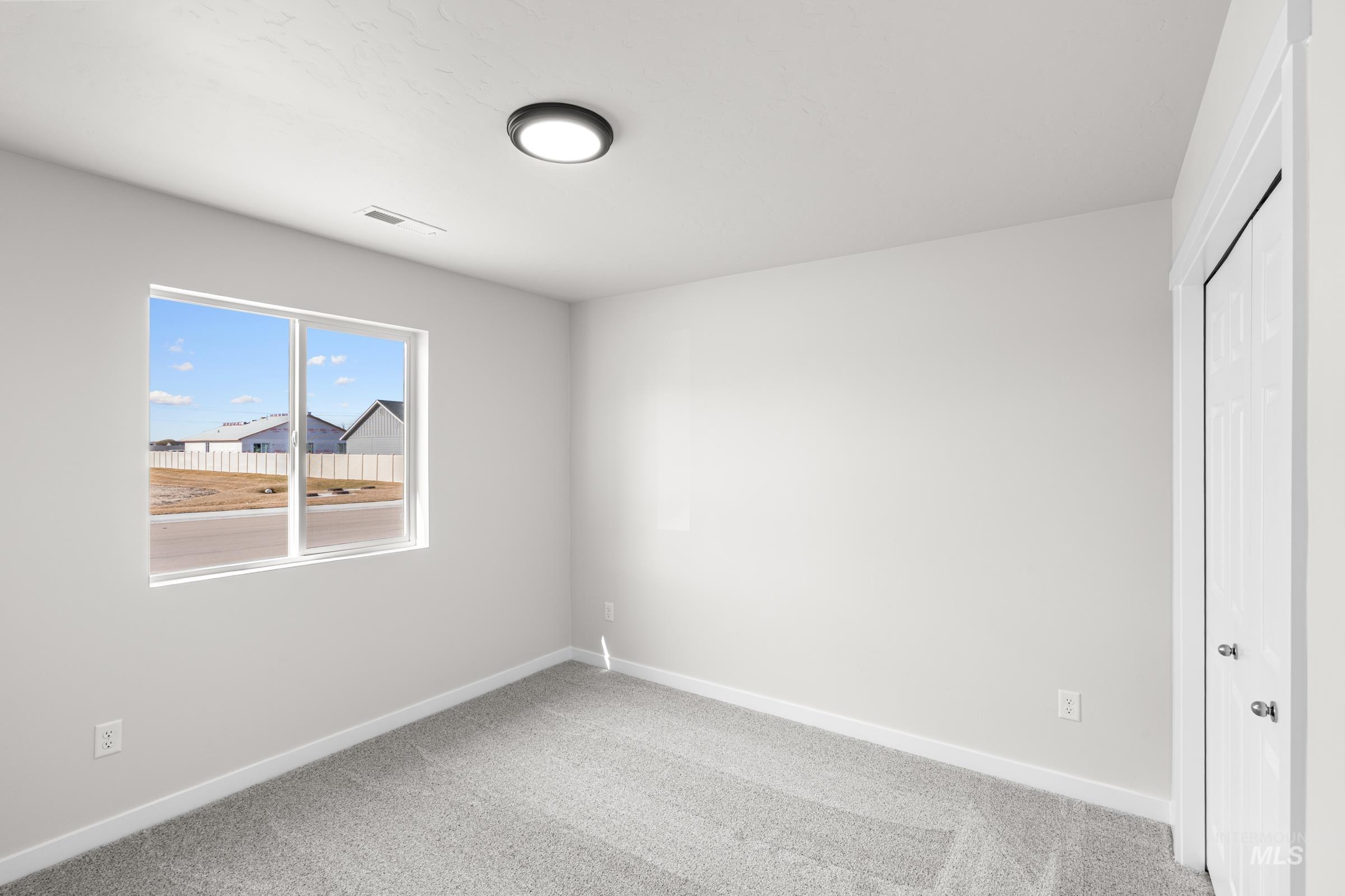 1622 Covington Street Middleton, ID 83644 - Photo 11 of 19 Unfurnished bedroom featuring a closet and carpet