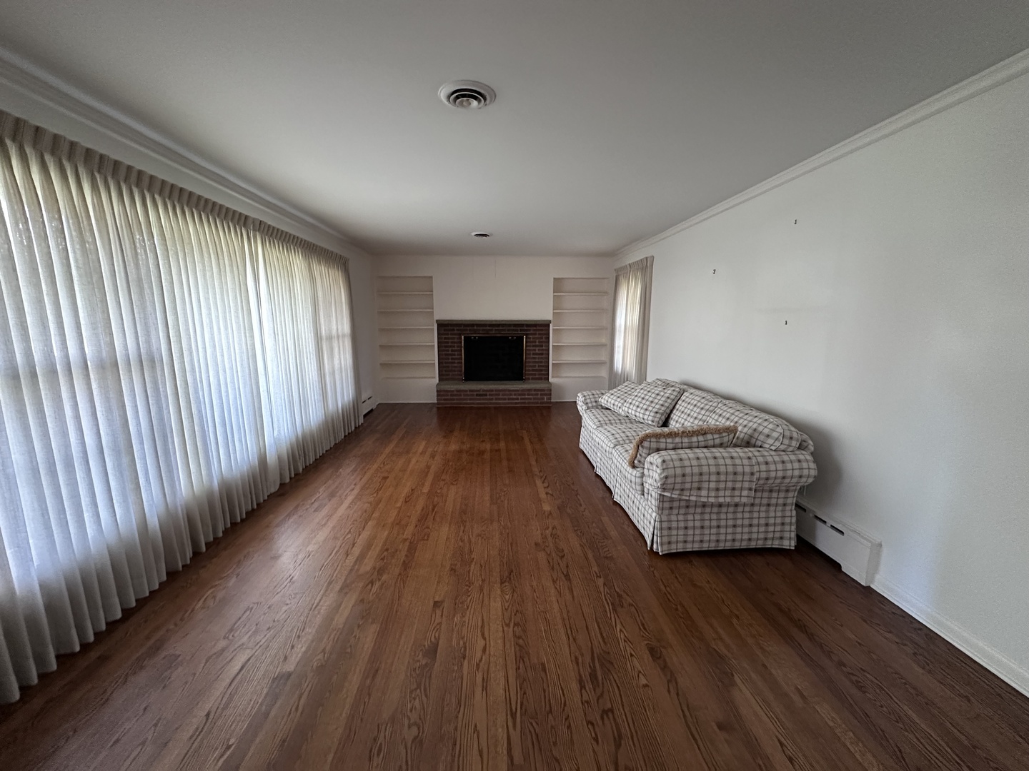 2300 Landwehr Road Northbrook, IL 60062 - Photo 12 of 28 wooden floor in an empty room with a window