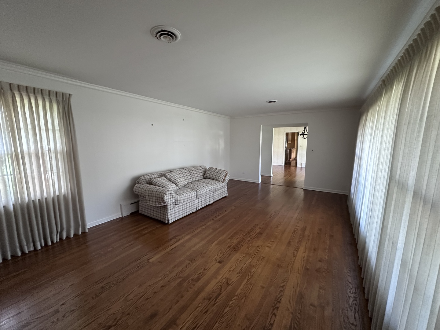 2300 Landwehr Road Northbrook, IL 60062 - Photo 13 of 28 a spacious bedroom with a bed and wooden floor