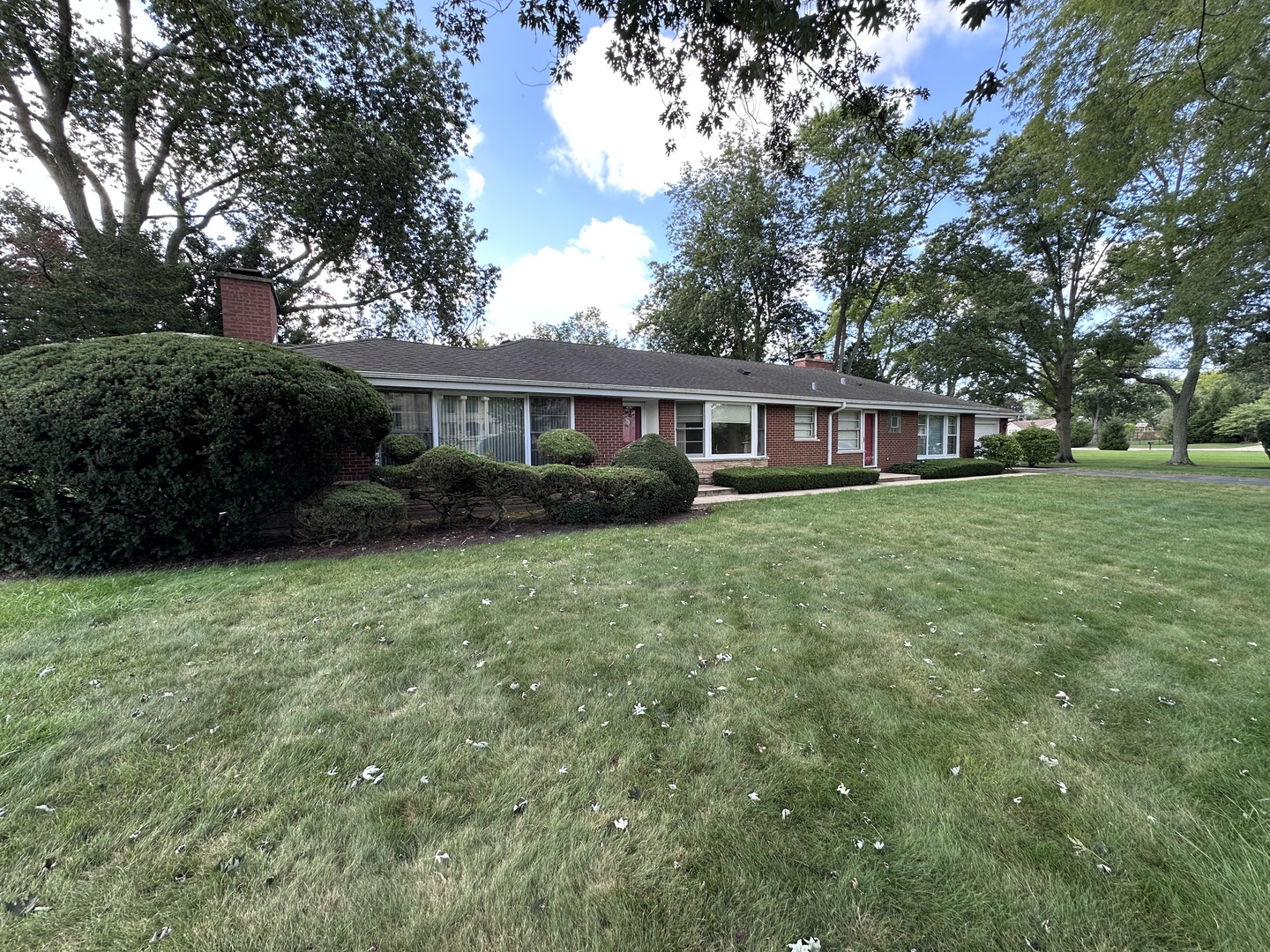 2300 Landwehr Road Northbrook, IL 60062 - Photo 2 of 28 a view of a house with a yard and sitting area