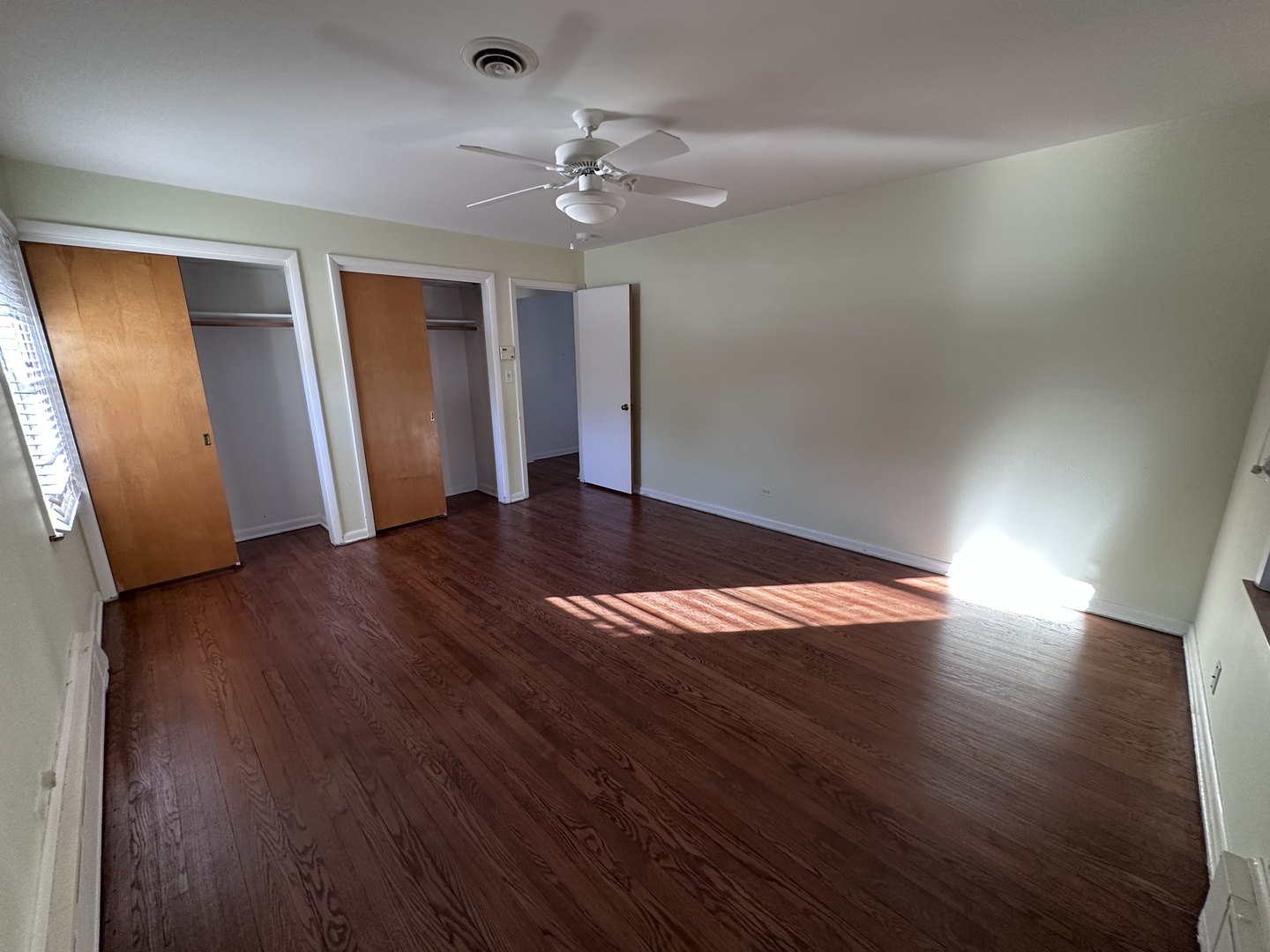 2300 Landwehr Road Northbrook, IL 60062 - Photo 22 of 28 wooden floor in an empty room with a window