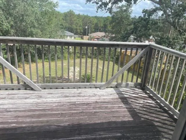a view of a house with a window and a door