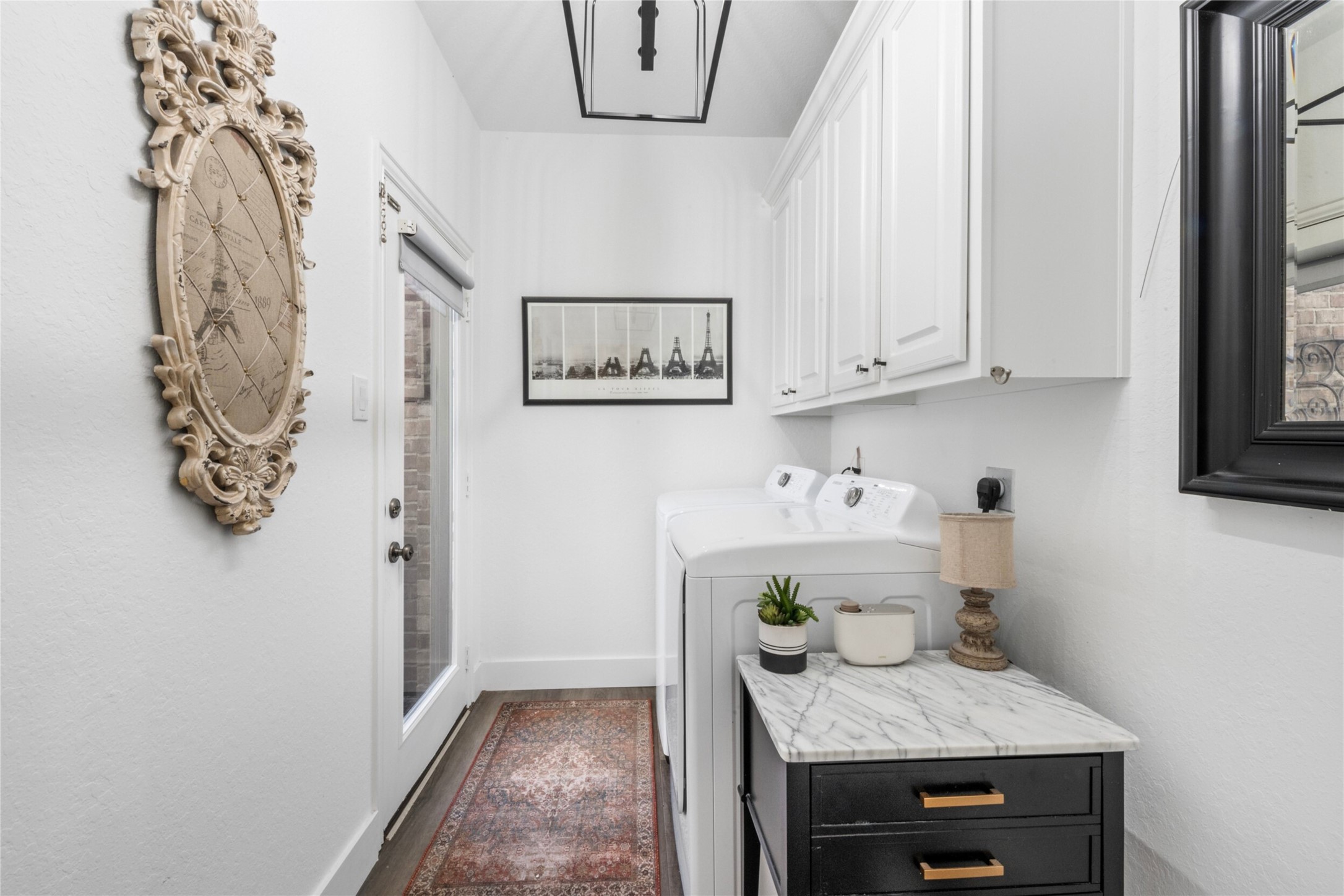 19527 Remington Manor Street Spring, TX 77379 - Photo 35 of 50 Laundry with door to the private courtyard.