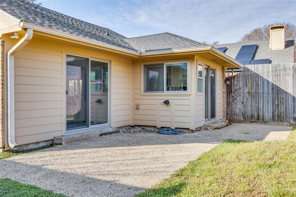 3919 Winter Park Lane Addison, TX 75001 - Photo 24 of 25 Back of house with roof with shingles