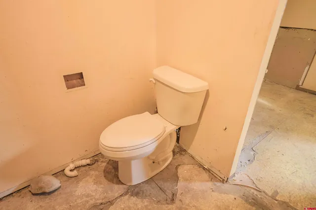 a view of a bathroom with a mirror