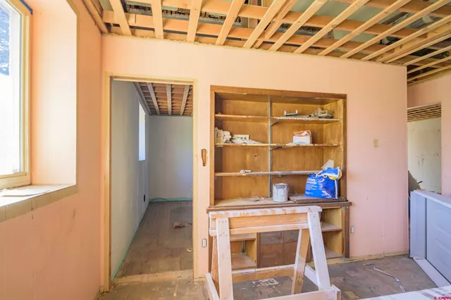 a view of a room that has a window