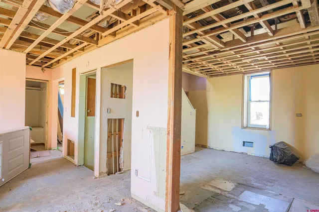 a bathroom with a sink mirror and a bathtub