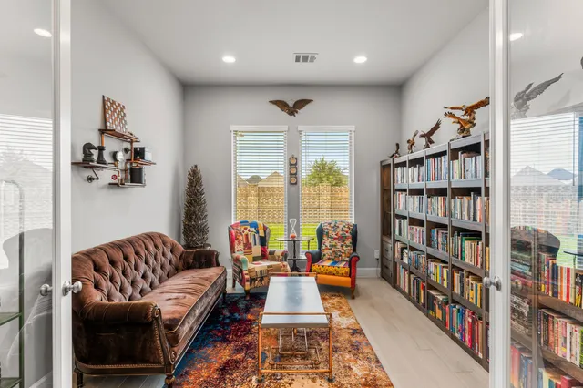 a living room with furniture and a couch