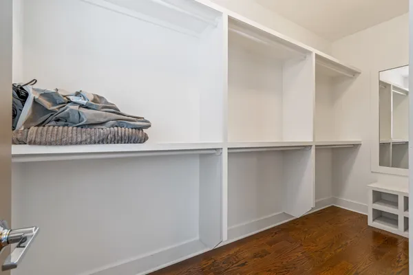 a view of a closet in a room