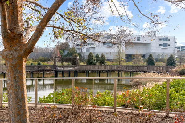 a view of a lake with a building in the background