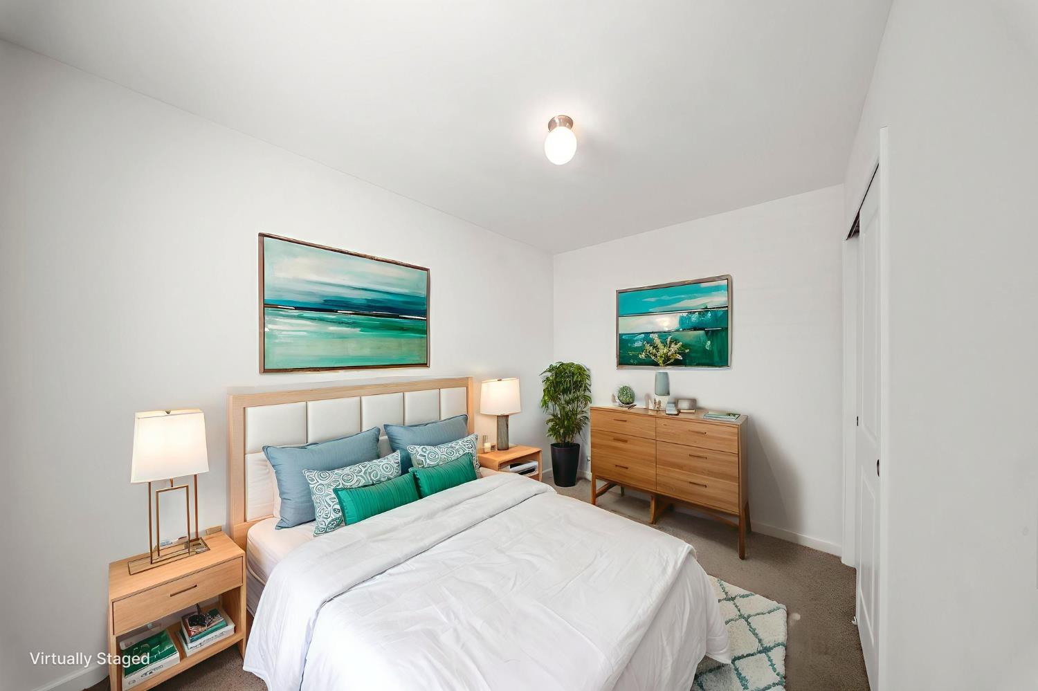 360 East Grant Line Road, Unit 19A Tracy, CA 95376 - Photo 11 of 19 a bedroom with two beds and a desk