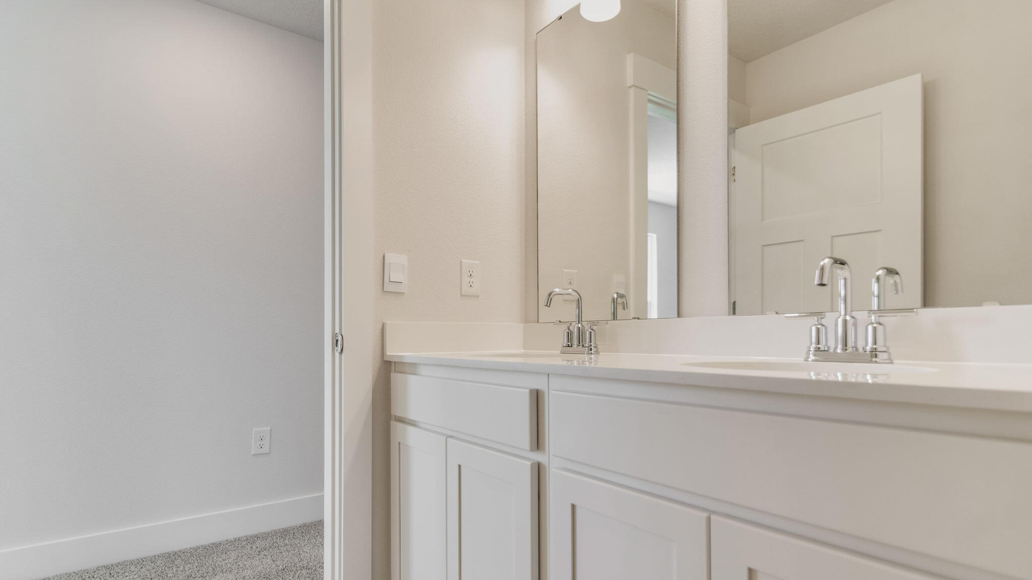 8044 Fir Tree Drive Milton, FL 32583 - Photo 27 of 32 a bathroom with a sink and a mirror