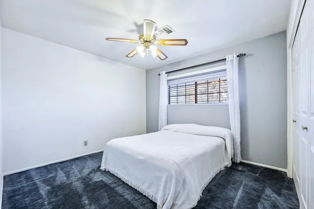 a large kitchen with stainless steel appliances granite countertop a large counter top stainless steel appliances and cabinets