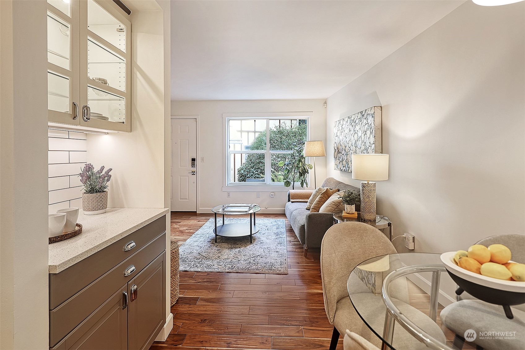1817 20th Avenue, Unit B Seattle, WA 98122 - Photo 12 of 28 a living room with furniture and a window