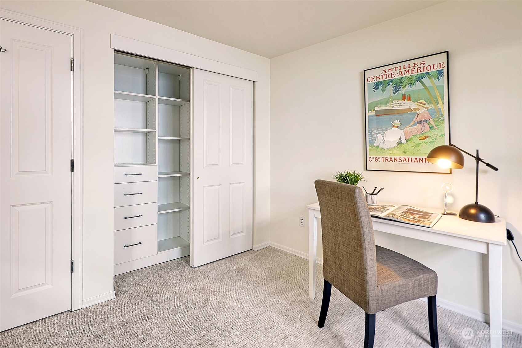 1817 20th Avenue, Unit B Seattle, WA 98122 - Photo 19 of 28 a workspace with furniture and a window