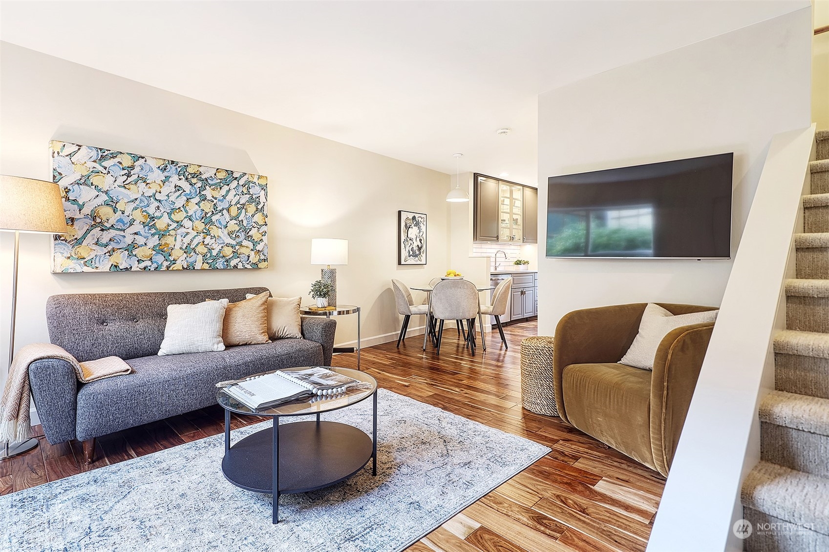 1817 20th Avenue, Unit B Seattle, WA 98122 - Photo 2 of 28 a living room with furniture and a flat screen tv