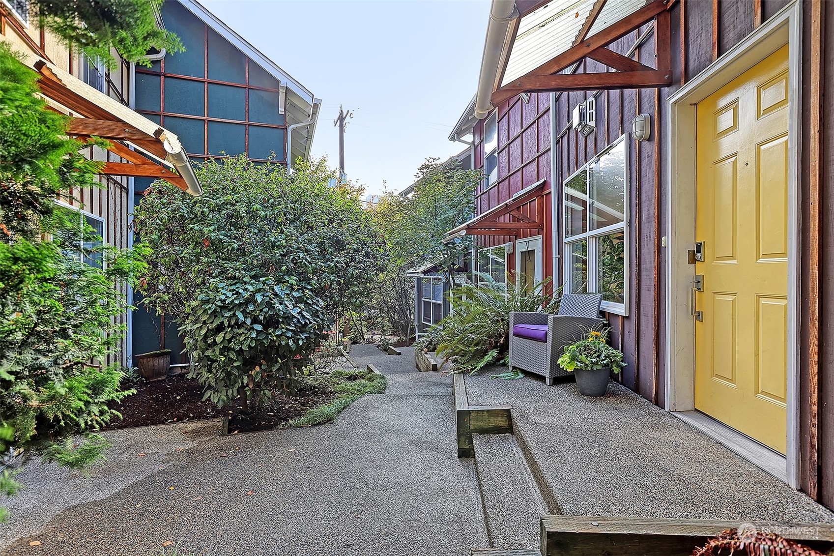 1817 20th Avenue, Unit B Seattle, WA 98122 - Photo 22 of 28 a view of brick house with potted plants