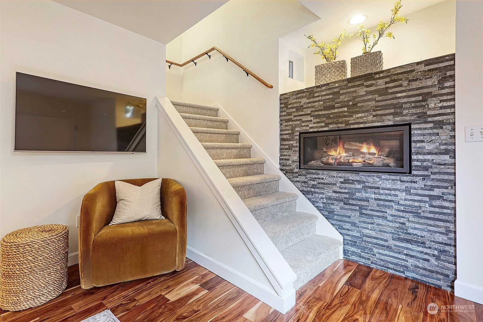 1817 20th Avenue, Unit B Seattle, WA 98122 - Photo 4 of 28 a living room with furniture and a fireplace