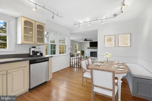 a kitchen with granite countertop lots of counter top space and dining table