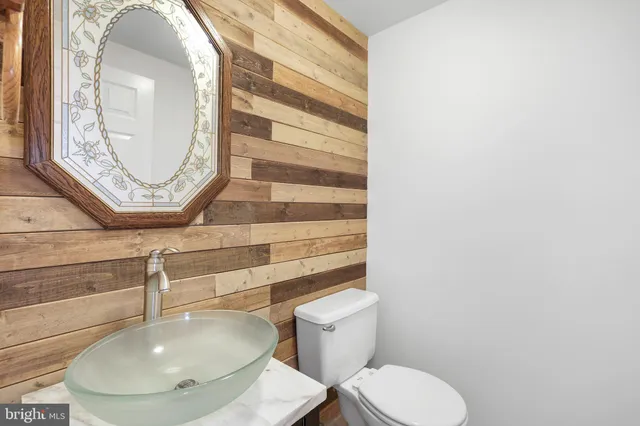 a bathroom with a toilet and a sink