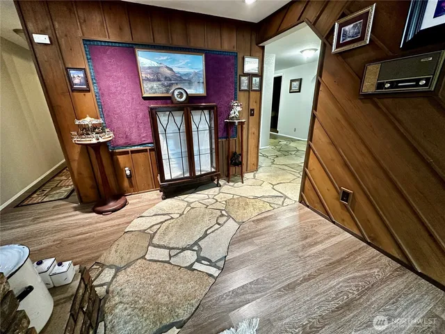 a living room with furniture fireplace and a flat screen tv