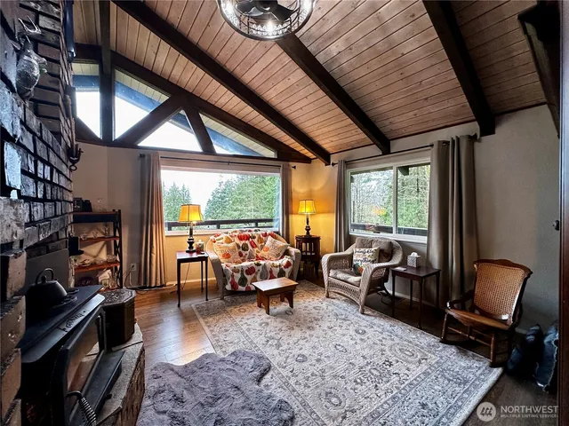 a bed room with furniture and a fireplace