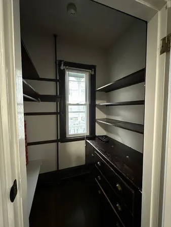a empty room with a closet