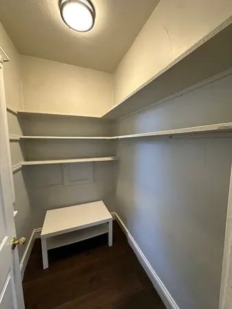 a hallway with a closet