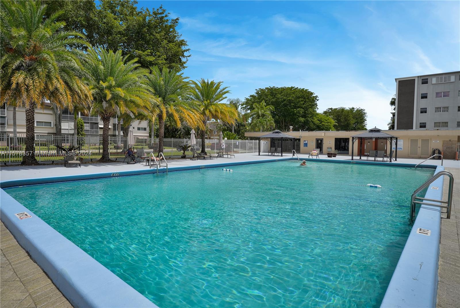 950 Hillcrest Drive, Unit 114 Hollywood, FL 33021 - Photo 18 of 24 a view of a house with a big yard