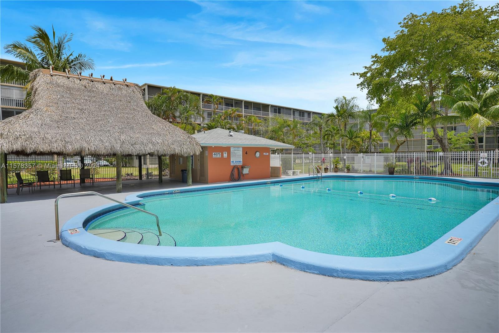 950 Hillcrest Drive, Unit 114 Hollywood, FL 33021 - Photo 19 of 24 a view of outdoor space yard swimming pool and patio