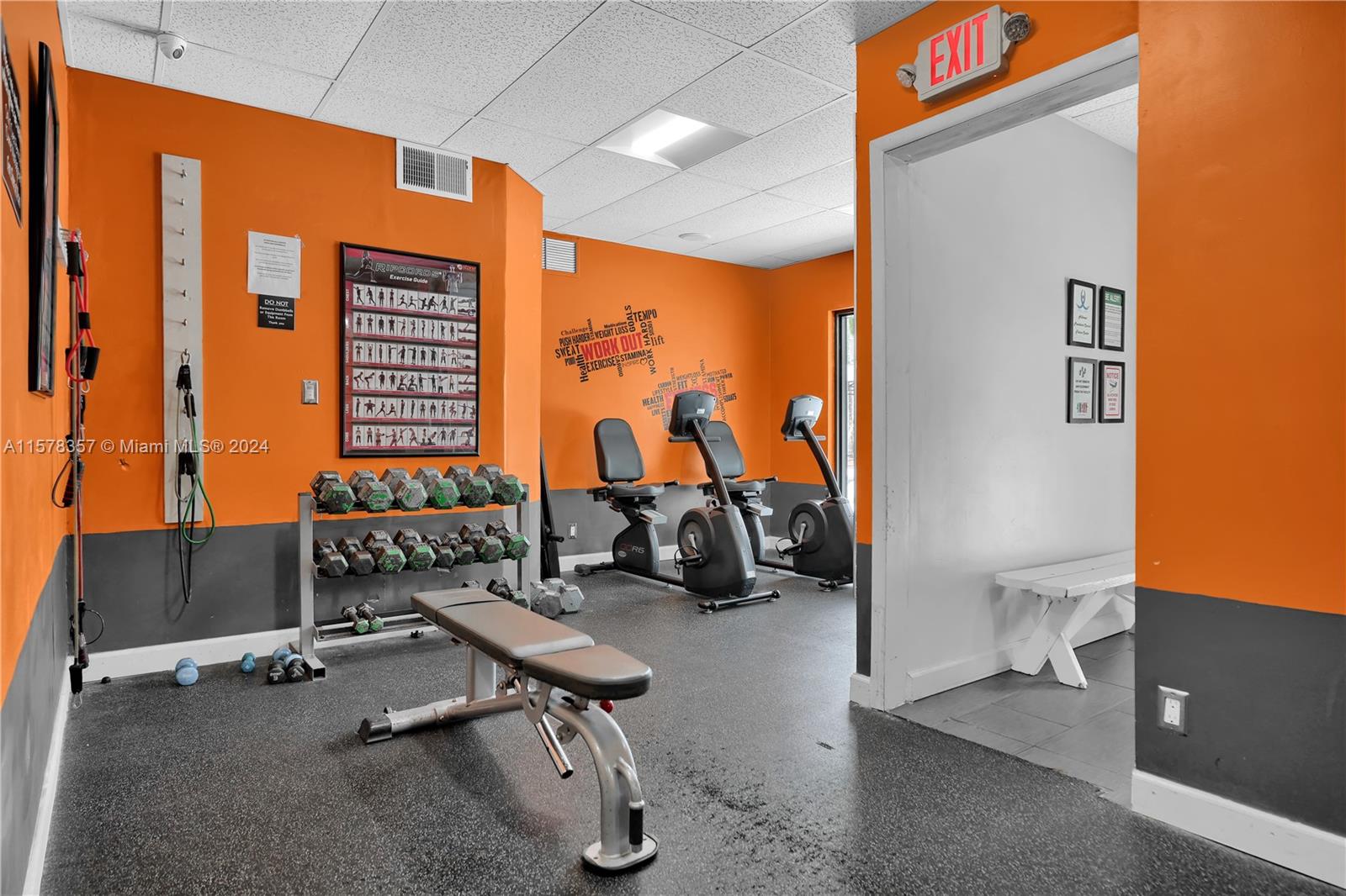 950 Hillcrest Drive, Unit 114 Hollywood, FL 33021 - Photo 21 of 24 a view of a room with gym equipment