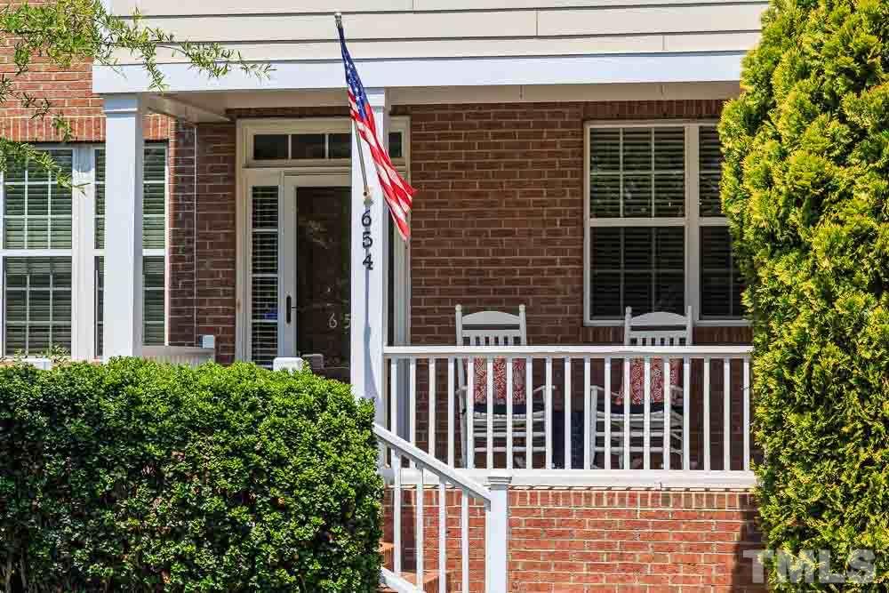 654 Democracy Street Raleigh, NC 27603 - Photo 3 of 24 a view of a house with a window