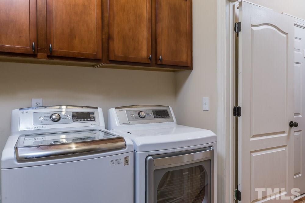 654 Democracy Street Raleigh, NC 27603 - Photo 21 of 24 a view of washer and dryer