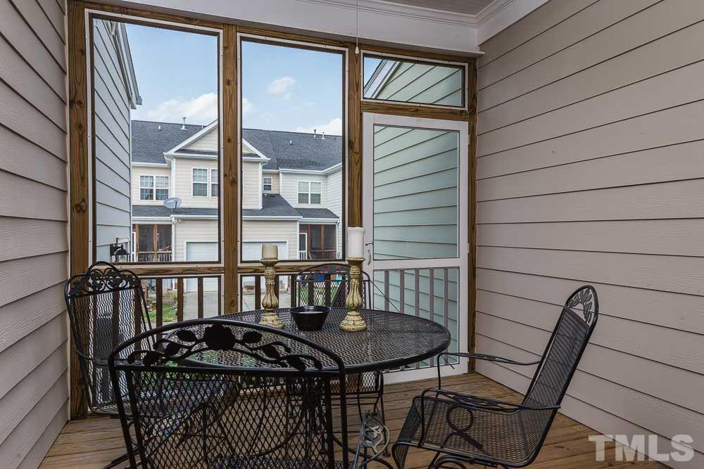 654 Democracy Street Raleigh, NC 27603 - Photo 22 of 24 a view of a balcony with furniture
