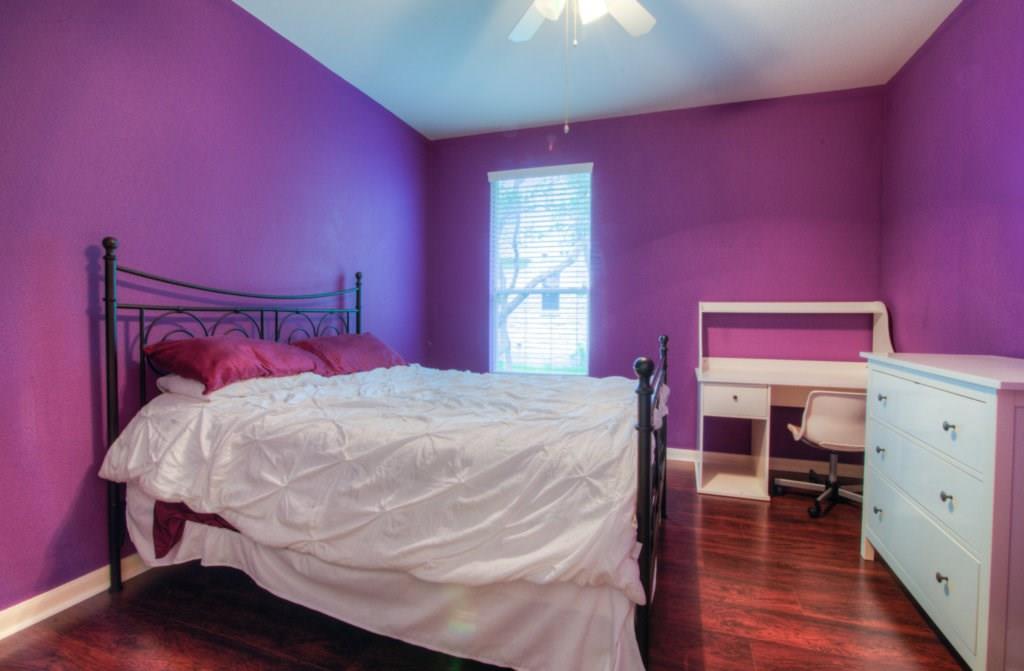 3454 Shiraz Loop Round Rock, TX 78665 - Photo 16 of 23 a bed room with a bed and a dresser