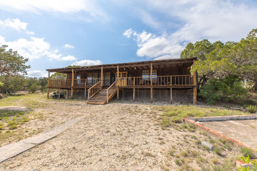 447-495 Blessing Lane Utopia, TX 78884 - Photo 18 of 24 a view of a house with yard and sitting area