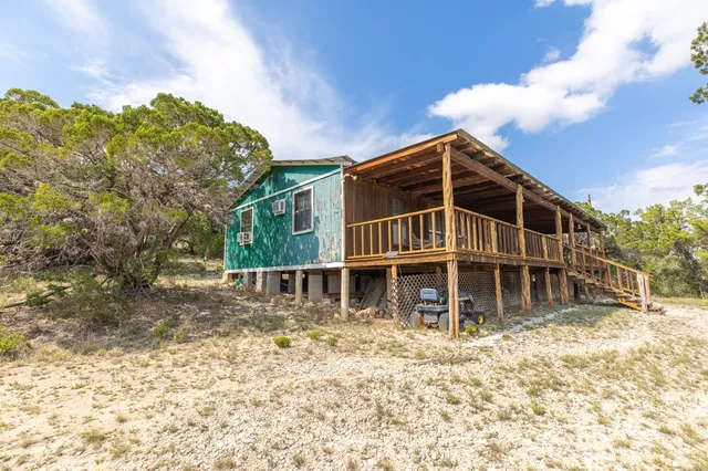 a house with trees in front of it