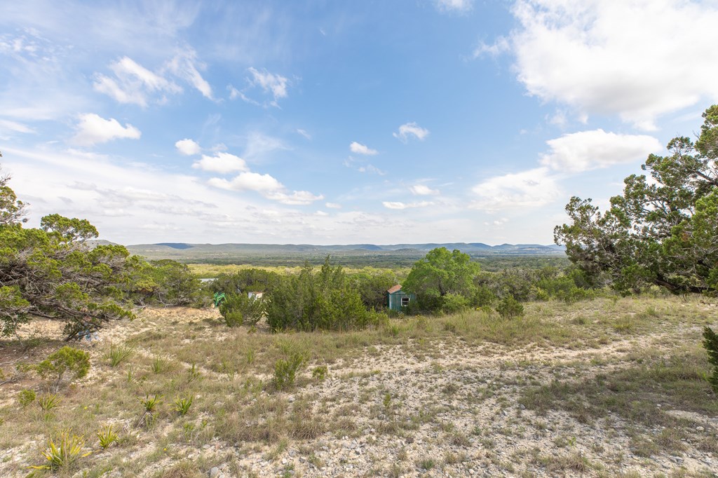 447-495 Blessing Lane Utopia, TX 78884 - Photo 22 of 24 a view of lake with mountain