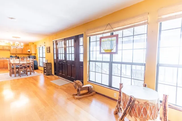 a view of a bedroom with a large window
