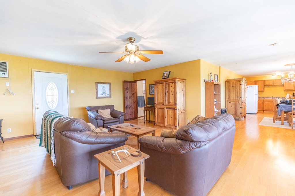 447-495 Blessing Lane Utopia, TX 78884 - Photo 6 of 24 a living room with fireplace furniture and a large window