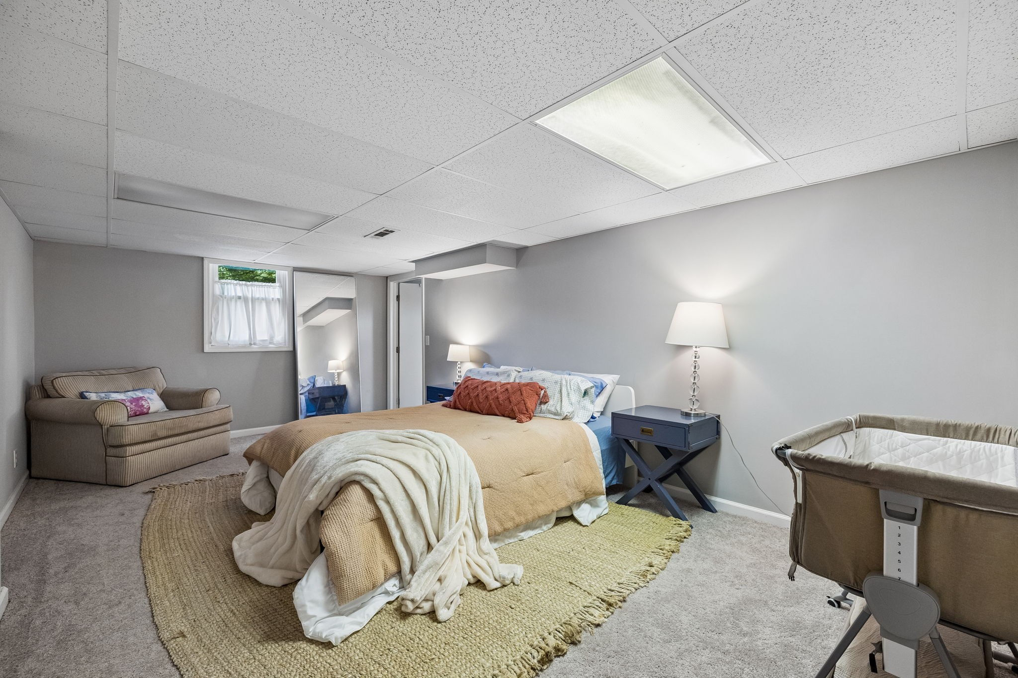 1326 Shahan Road Pleasant View, TN 37146 - Photo 29 of 41 a bedroom with a bed and wooden floor