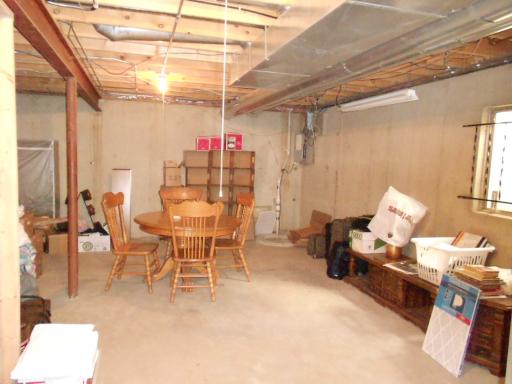 21143 Deerpath Road Frankfort, IL 60423 - Photo 16 of 16 a dining room with furniture and a chandelier