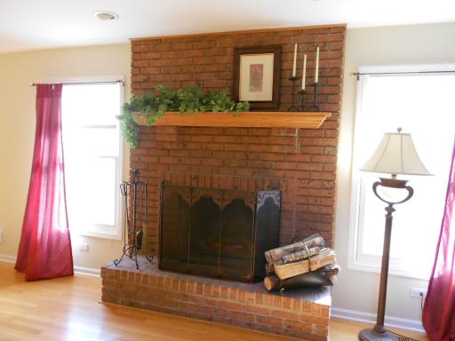 21143 Deerpath Road Frankfort, IL 60423 - Photo 5 of 16 a living room with furniture and a fireplace