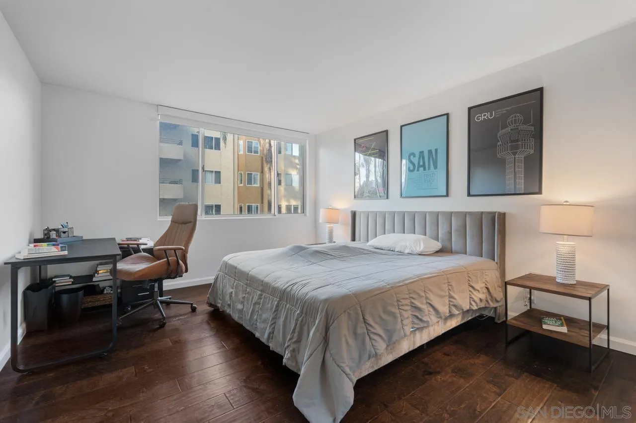 3635 7th Avenue, Unit 2D San Diego, CA 92103 - Photo 37 of 68 a bedroom with a bed and a large window