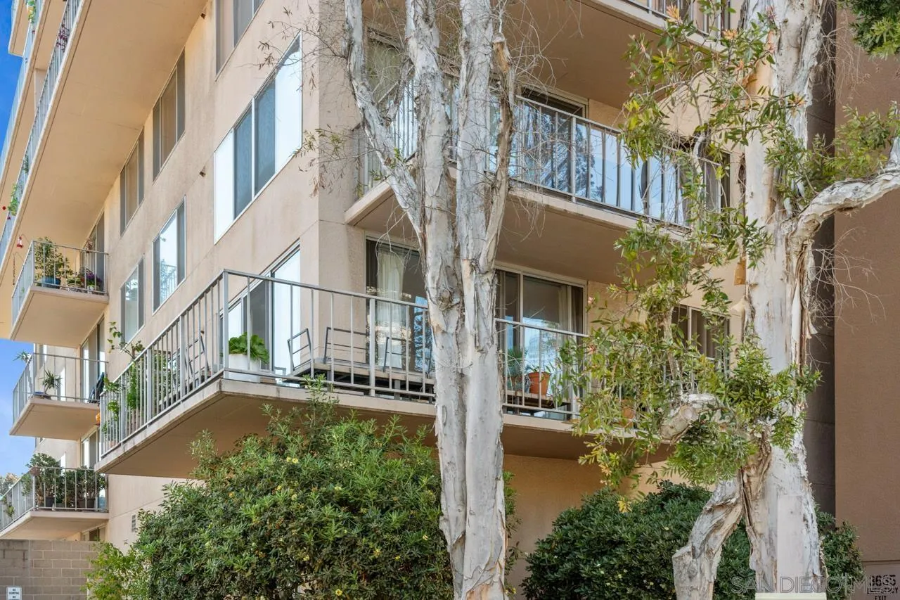 3635 7th Avenue, Unit 2D San Diego, CA 92103 - Photo 54 of 68 an aerial view of a house with swimming pool and garden